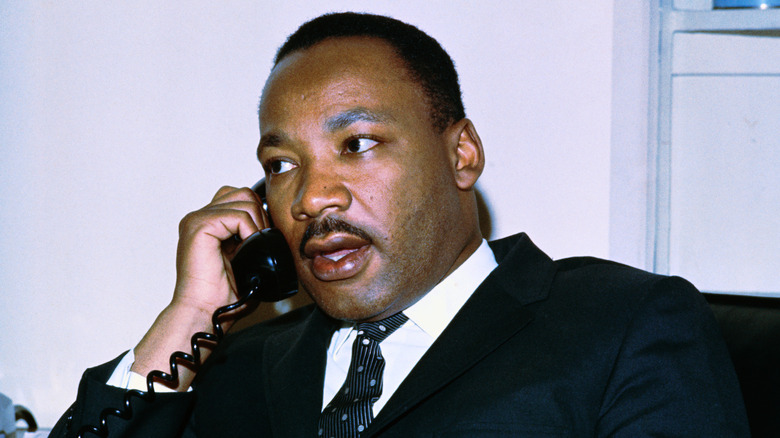 Martin Luther King Jr. talking on the phone