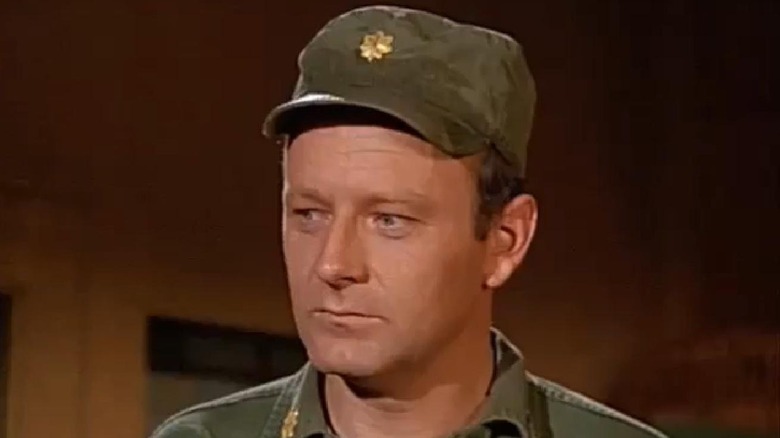 Frank Burns (Larry Linville) stands incredulously in M*A*S*H
