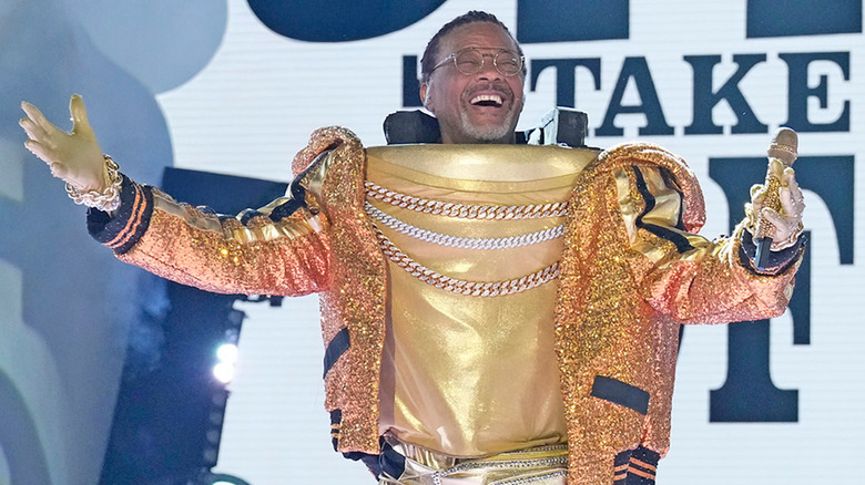 Judge Greg Mathis as 14 Karat Carrot on The Masked Singer