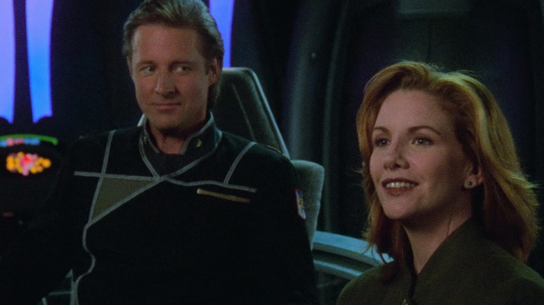 John Sheridan and Anna Sheridan sit together on a spaceship in "Babylon 5" (1994)