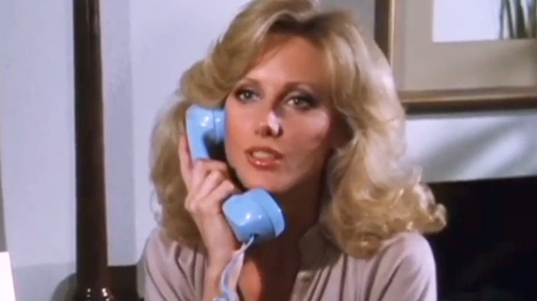 Morgan Fairchild takes a phone call as Jenna Wade during her one appearance on Dallas.