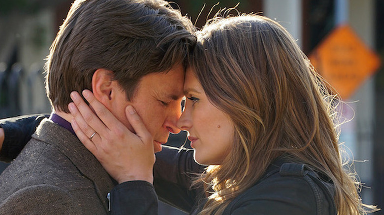 Nathan Fillion and Stana Katic embrace as their charachters from Castle