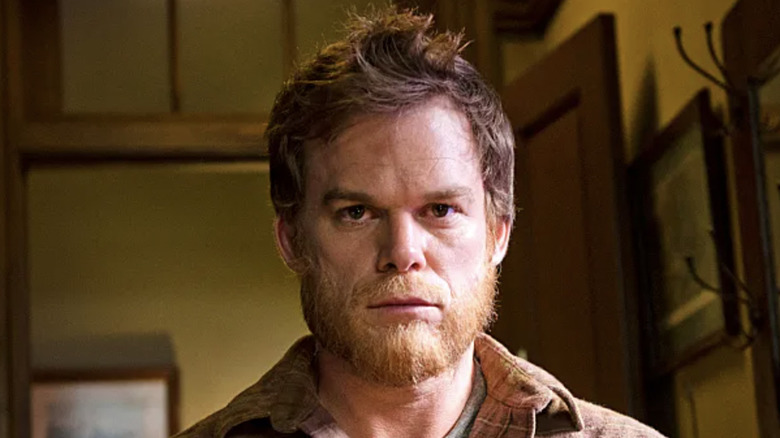 Michel C. Hall as Dexter in the series finale of Dexter, staring ahead in his new life