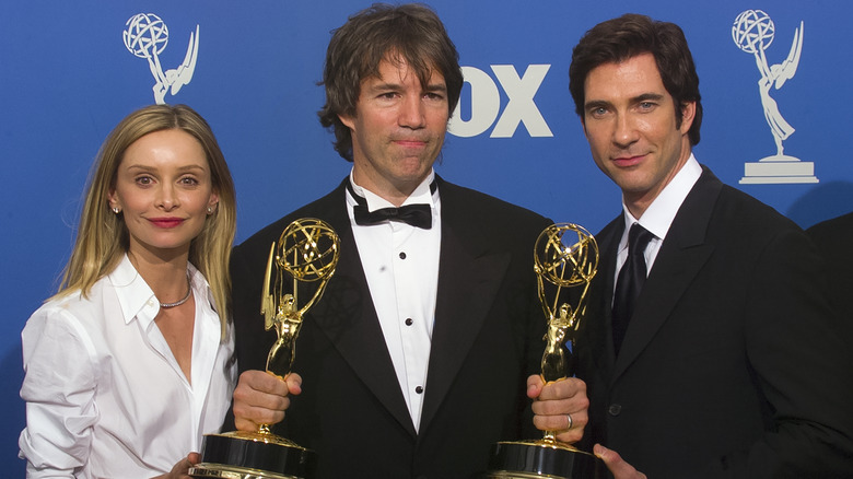 David E. Kelley with his two Emmys, flanked by Calista Flockhart and Dylan McDermott