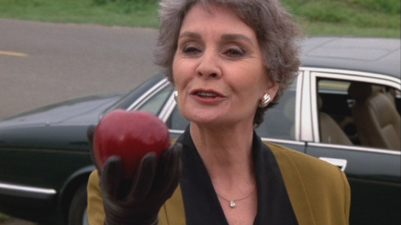 Eudora McVeigh holds up an apple in "Murder, She Wrote"