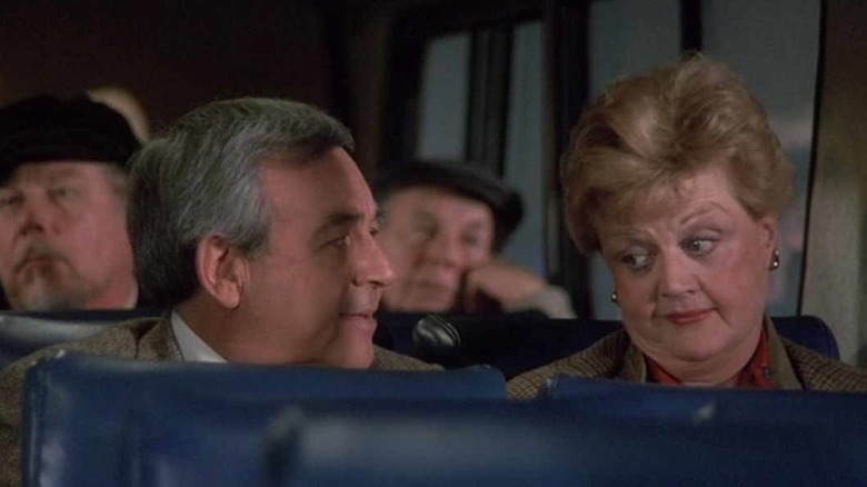 Jessica Fletcher and Sheriff Amos Tupper ride a bus in "Murder, She Wrote"