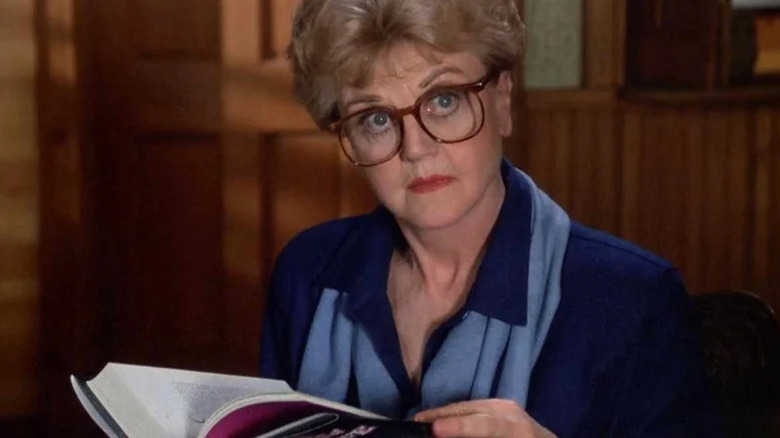 Jessica Fletcher reads a book in "Murder, She Wrote"