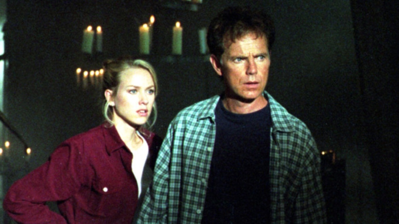 Kate Russell and Nathan Bradford standing side by side in "Sleepwalkers"