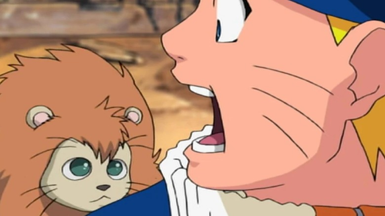 Naruto looking at an Onbaa stuck on his back, shocked