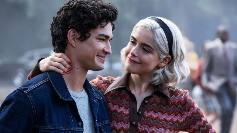 Sabrina Spellman embraces Nicholas Scratch.