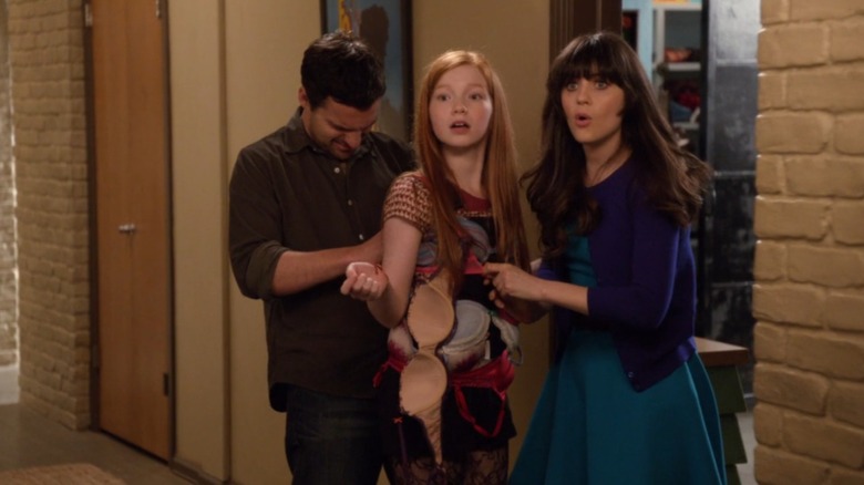 Nick and Jess help a child stuck in bras