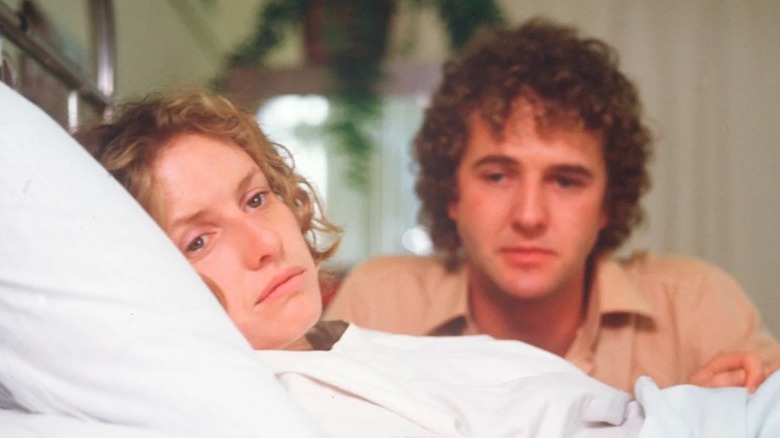 Brendan watching over a sick Molly in "A Country Practice"