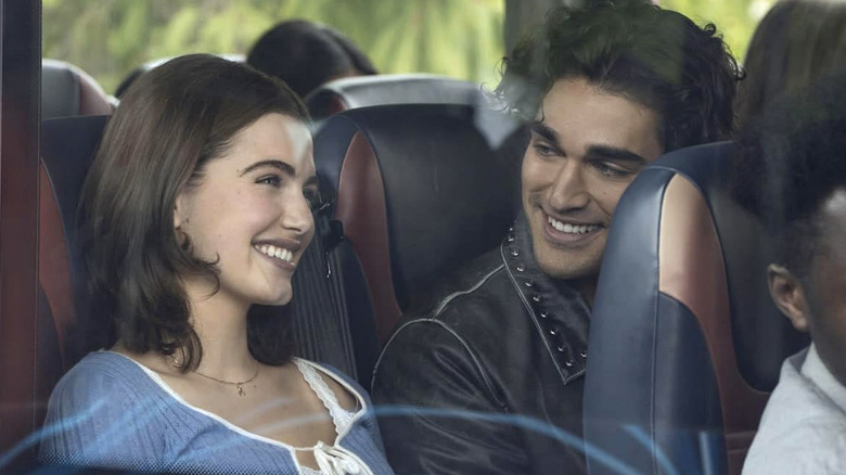 Hannah and Justin sitting next to each other on a bus in "Off Campus"