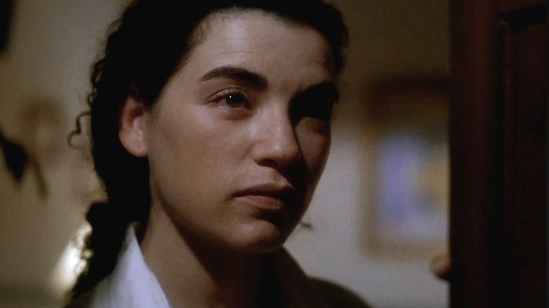 Carol Hathaway standing in a doorway