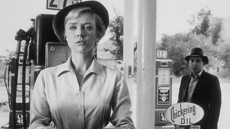 Nan Adams watched by the mysterious hitchhiker in "The Twilight Zone"