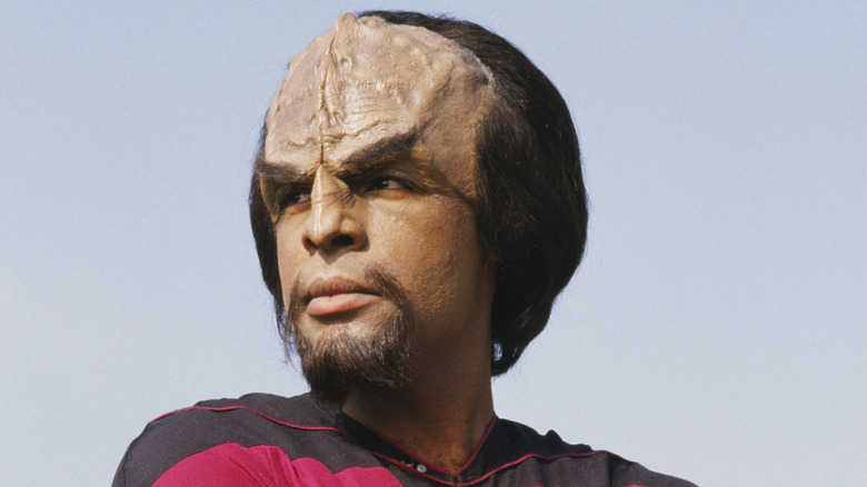 Michael Dorn as Worf in front of a blue sky
