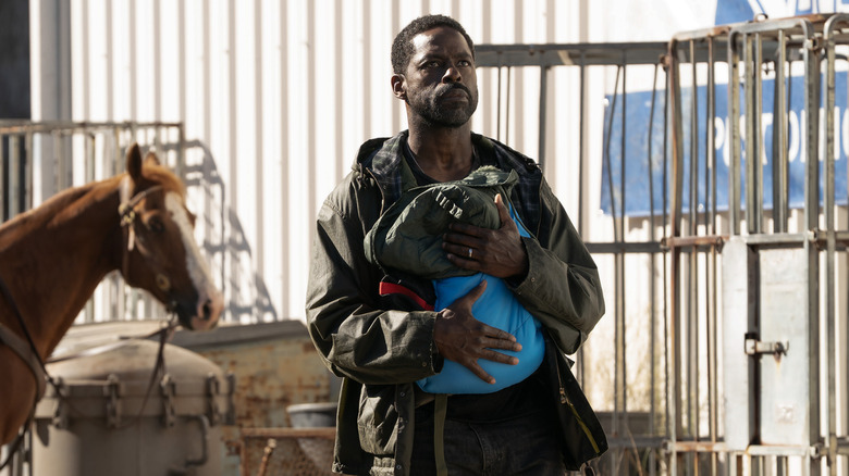 Xavier and baby in Paradise