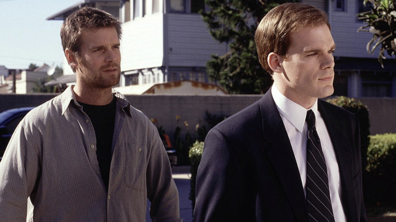 Nate and David Fisher walking to car on sunny day