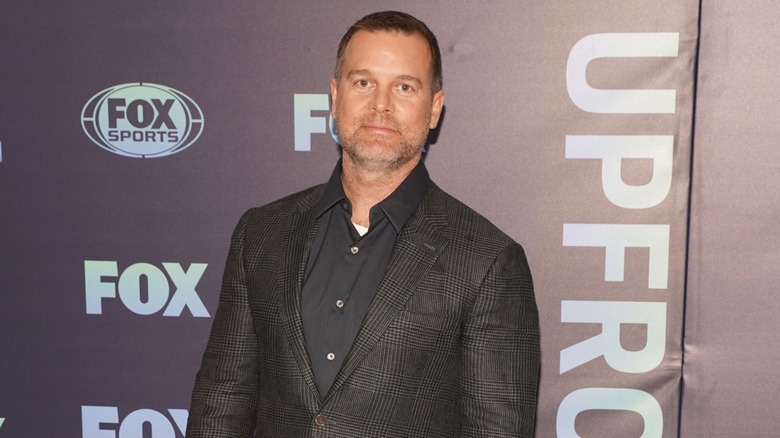 Peter Krause wearing a gray suit