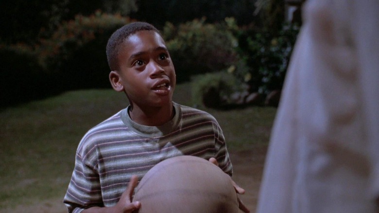 Brandon Hammond's Michael Jordan holding a basketball in Space Jam