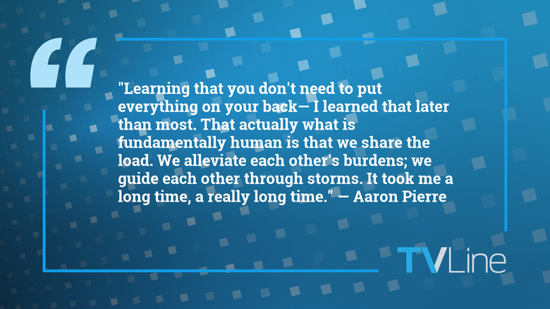 A blue image of white text that reads: ""Learning that you don't need to put everything on your back— I learned that later than most. That actually what is fundamentally human is that we share the load. We alleviate each other's burdens; we guide each other through storms. It took me a long time, a really long time." — Aaron Pierre. The TVLine logo is in the bottom right of the image.