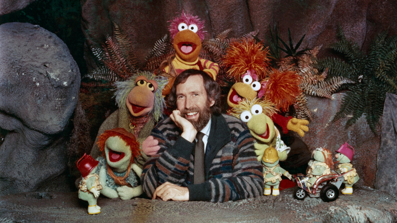 Jim Henson with his puppet creations
