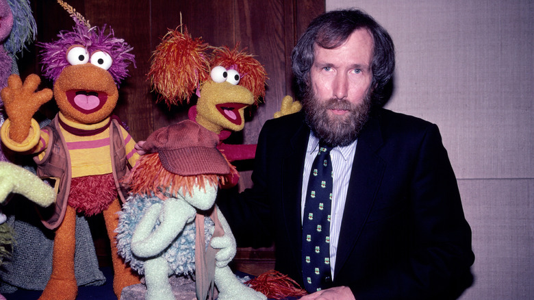 Jim Henson with his puppet creations