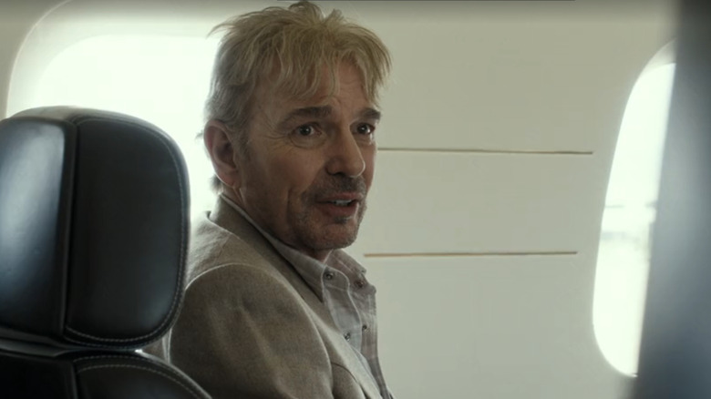 Billy Bob Thornton as Tommy Norris sits on a plane in Landman