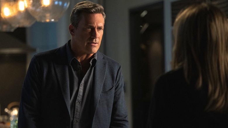 Jon Hamm as Paul looks intently at Jennifer Aniston as Alex in The Morning Show