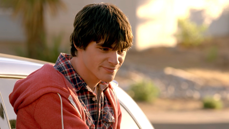 Walt Jr. leaning against new car in Breaking Bad