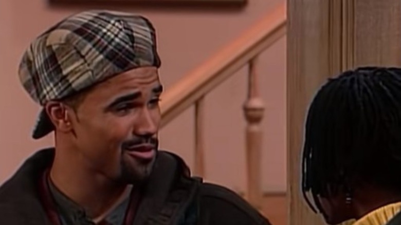 Shemar Moore as Jon Marc talking to Maxine in doorway of apartment on Living Single