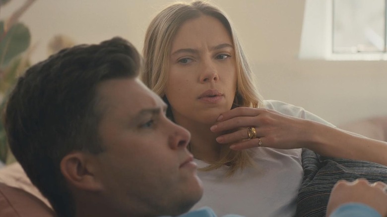 Scarlett Johansson and Colin Jost lying in bed in Amazon Alexa's "Mind Reader" commercial