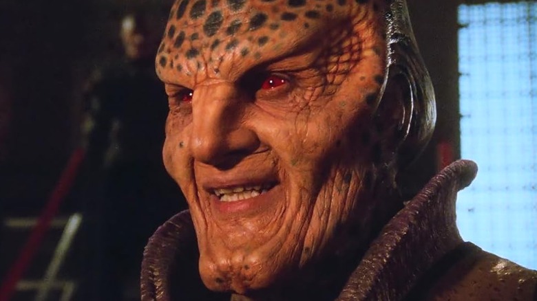 G'kar grins while looking at someone in "Babylon 5" (1994)