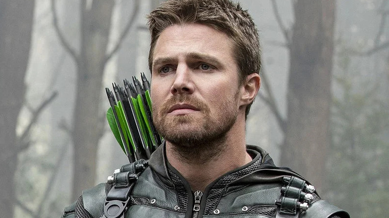 Stephen Amell as Oliver Queen looks upset, on Arrow