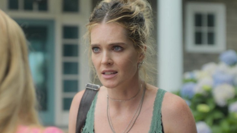 Meghann Fahy as Devon looking worried in Sirens