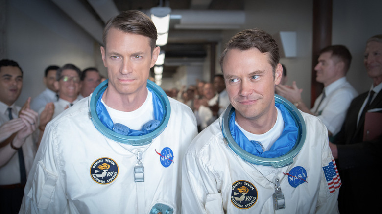 Edward Baldwin and Gordo Stevens in flight suits with helmets off