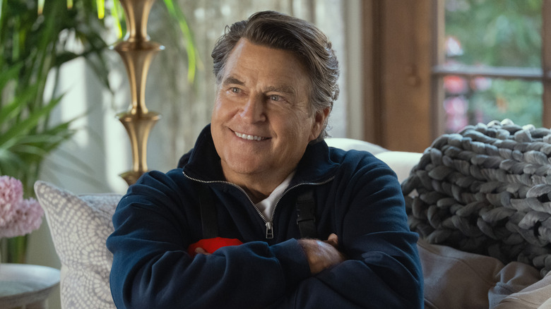 Shrinking's Ted McGinley hugs a pillow