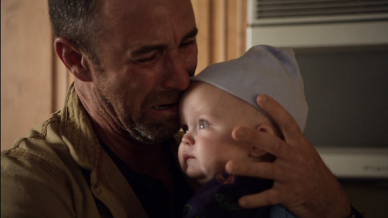Jamie McShane as Cameron Hayes, holding baby Abel in Sons of Anarchy.