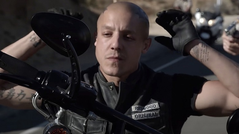 Theo Rossi as Juice Ortiz, surrendering to cops in Sons of Anarchy.