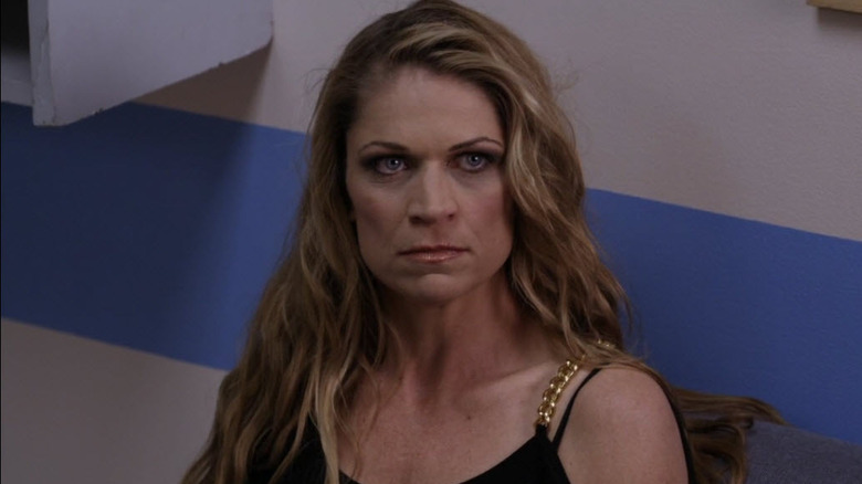 Dendrie Taylor as Luann Delaney, scowling in Sons of Anarchy.