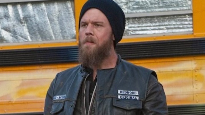 Ryan Hurst as Opie Winston, leaning against a school bus in Sons of Anarchy.