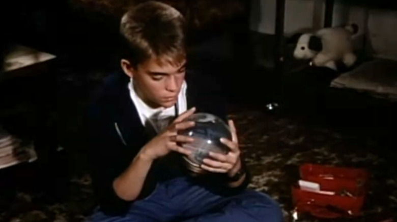 St. Elsewhere, the real Tommy staring at his snow globe