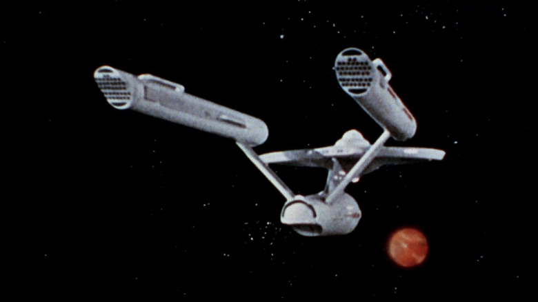 The Enterprise heads for a strange new world on the original Star Trek