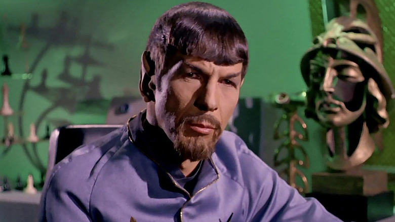 Closeup of Mr. Spock sitting and looking serious in "Star Trek"