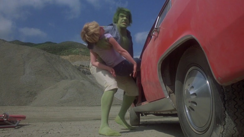 The Hulk pulls an unconscious woman out of a car on "The Incredible Hulk"