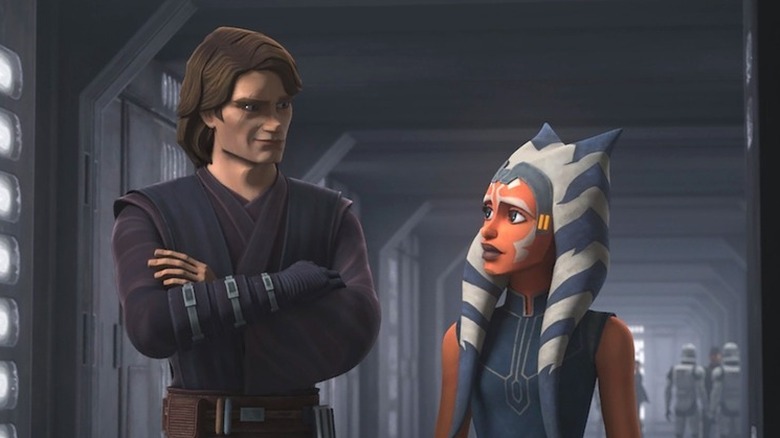 Anakin Skywalker and Ahsoka Tano stand together in "Star Wars: The Clone Wars"
