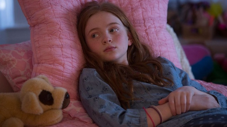 Suzanne Ballard relaxes on a large pink cushion on American Odyssey.