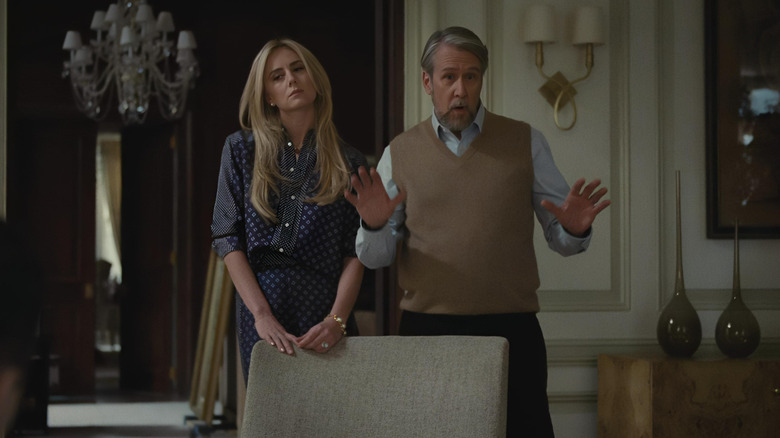 Justine Lupe and Alan Ruck as Willa Ferreyra and Connor Roy, blithely welcoming their guests on Succession