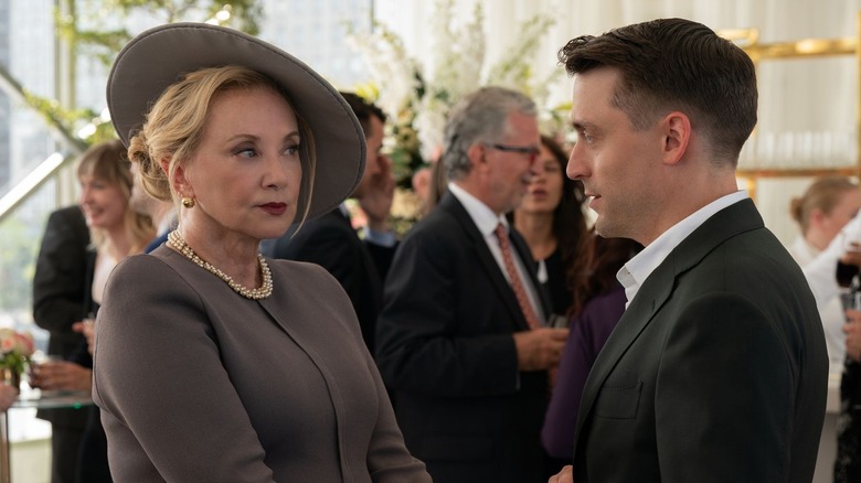 J. Smith-Cameron and Kieran Culkin as Gerri Kellman and Roman Roy, having a tense conversation at Connor's wedding on Succession