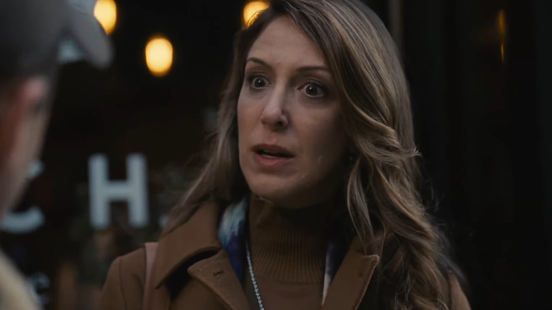 Natalie Gold as Rava Roy, appearing shocked as she speaks to Kendall on the street on Succession